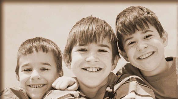 three smiling boys